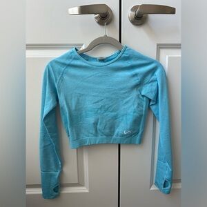 TLF long sleeve crop top size small with open back and thumb holes